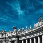 statues on top of building